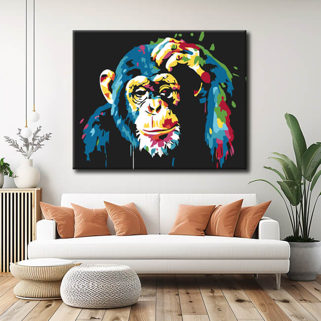 Painting by numbers Colorful monkey holds his hand on his head